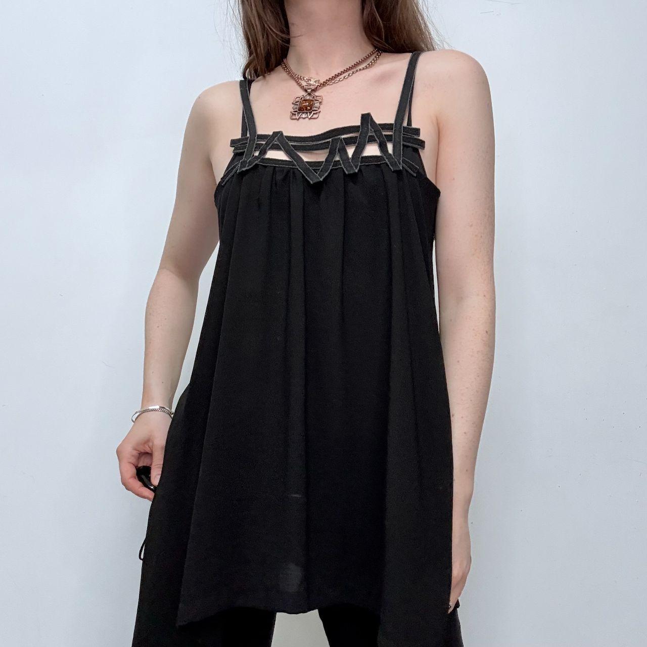 Black asymmetric flared Cop Copine vest