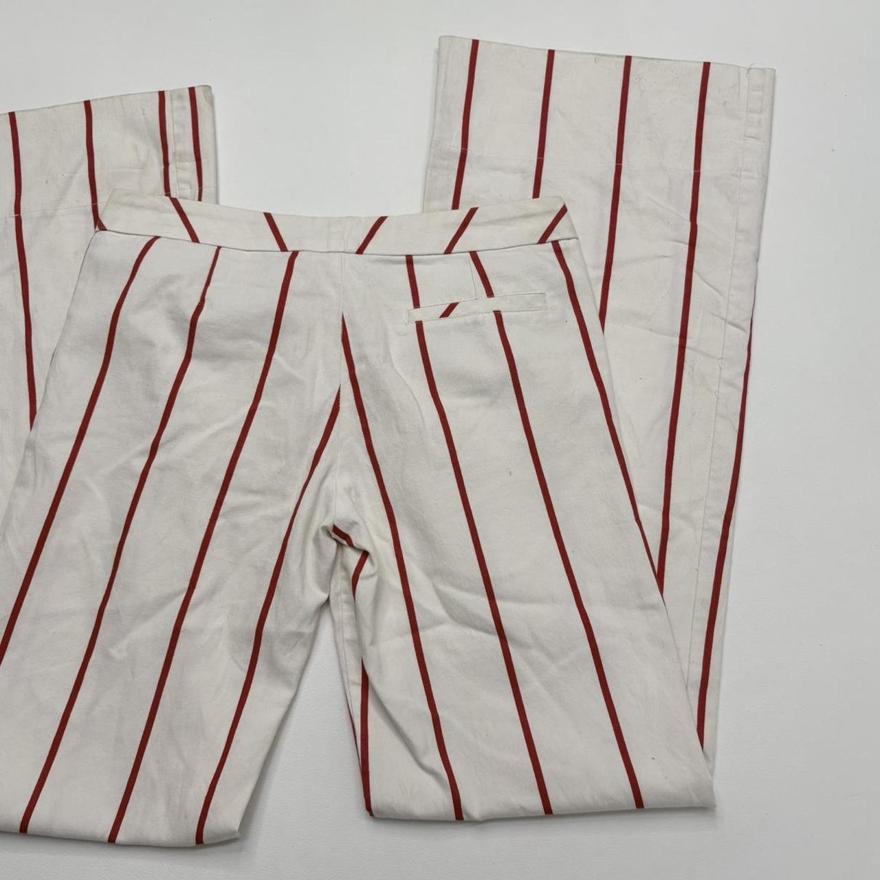 White wide leg pinstripe trousers