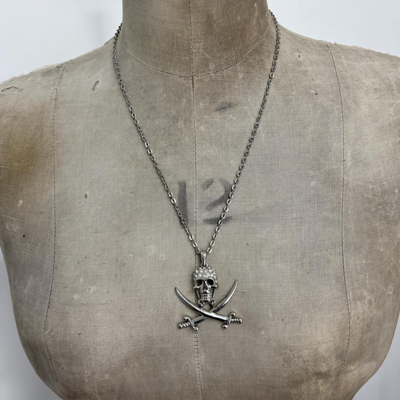 Silver skull and cross bone necklace