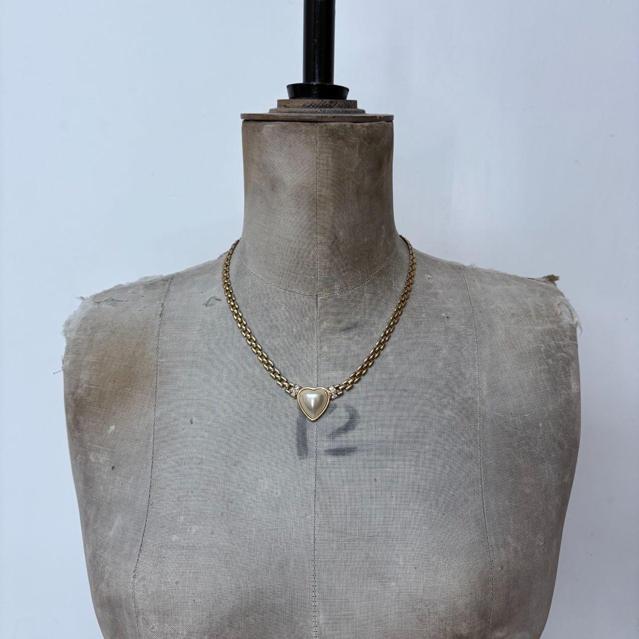 Gold tone chain heart necklace