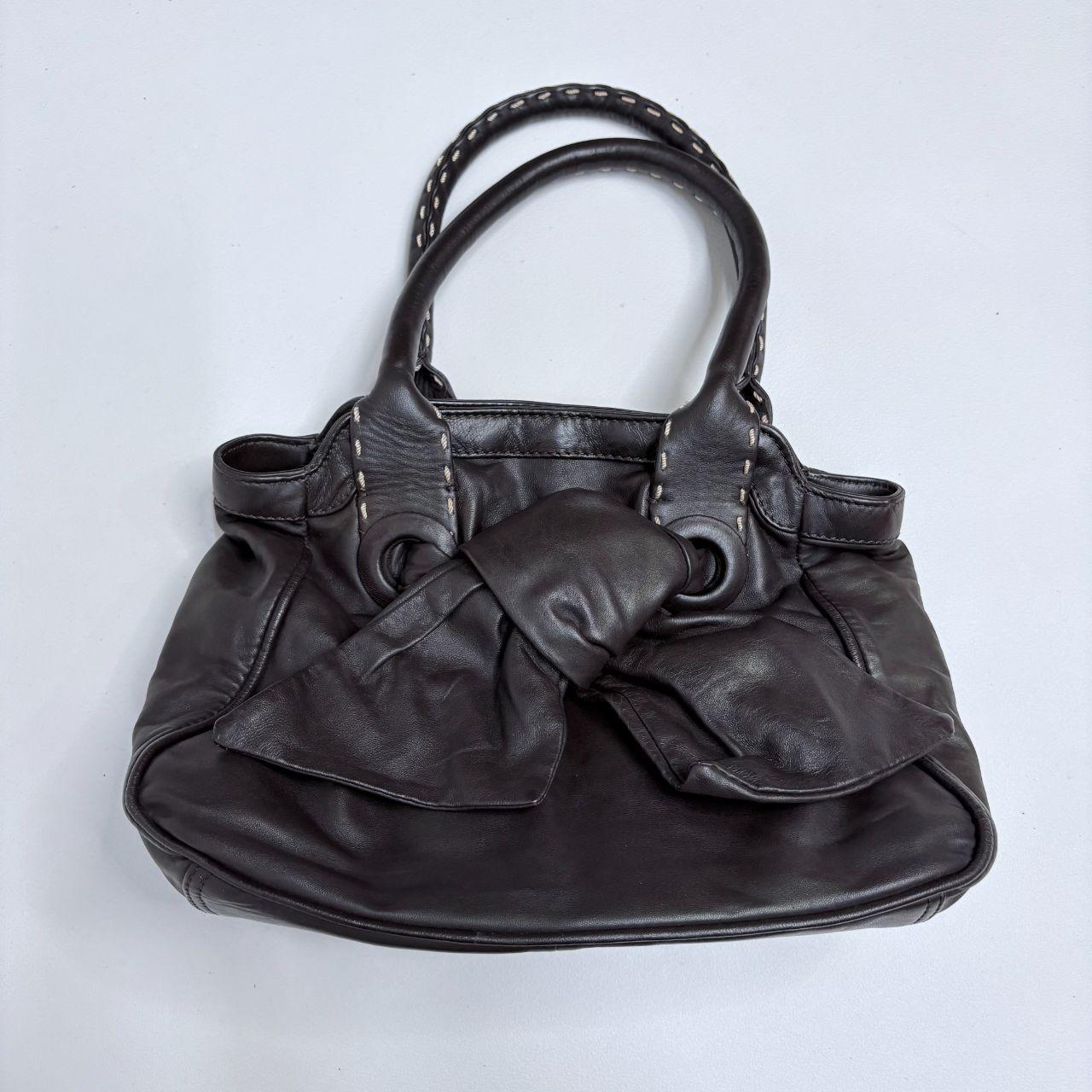 Brown leather bow bag