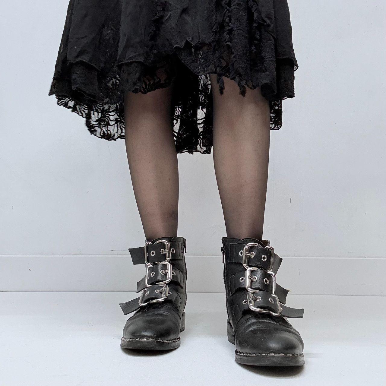 Black leather studded buckle boots
