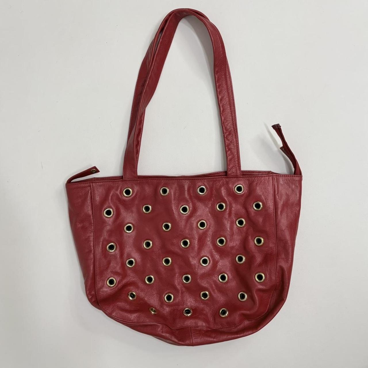 Red leather studded eyelet bag