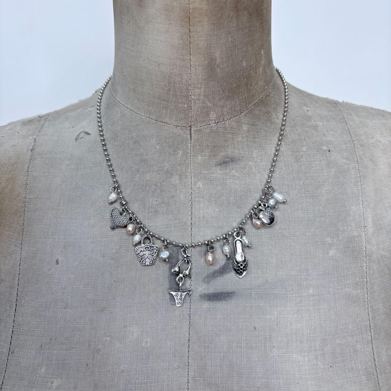 Silver charm pearl necklace