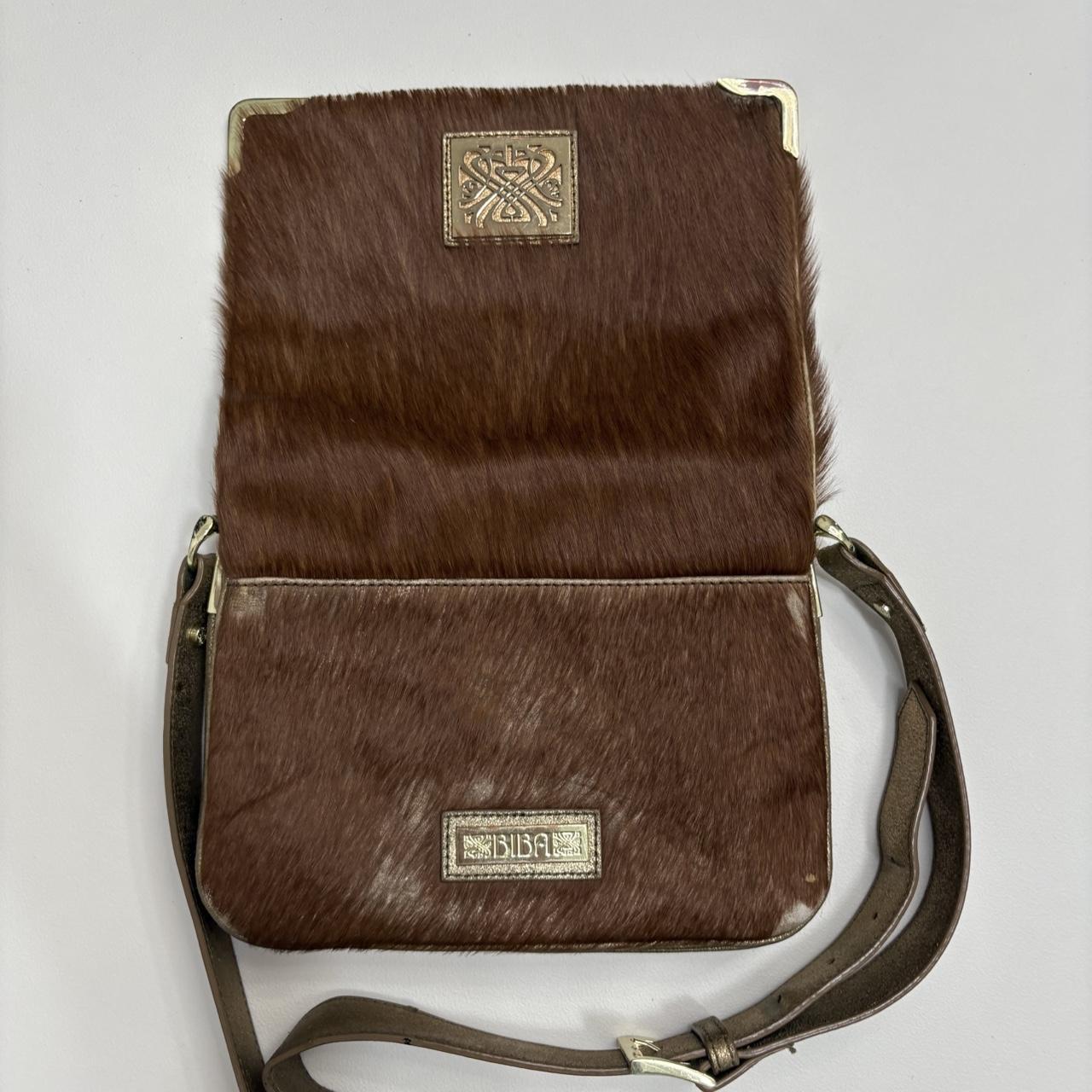 Tan pony hair cow hide cross body bag