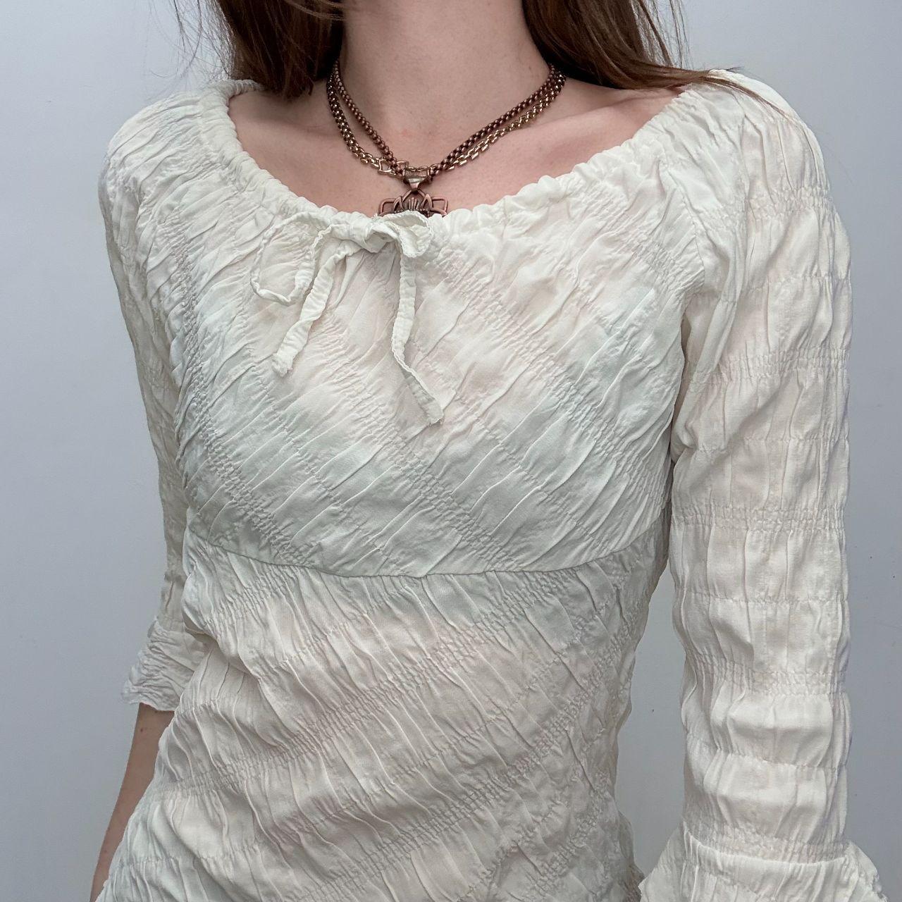 Cream flared wide neck crinkle shirt
