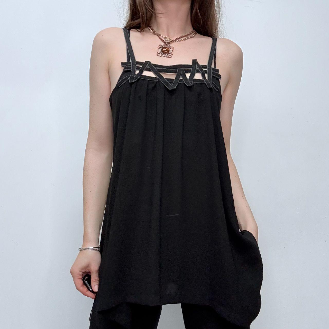 Black asymmetric flared Cop Copine vest