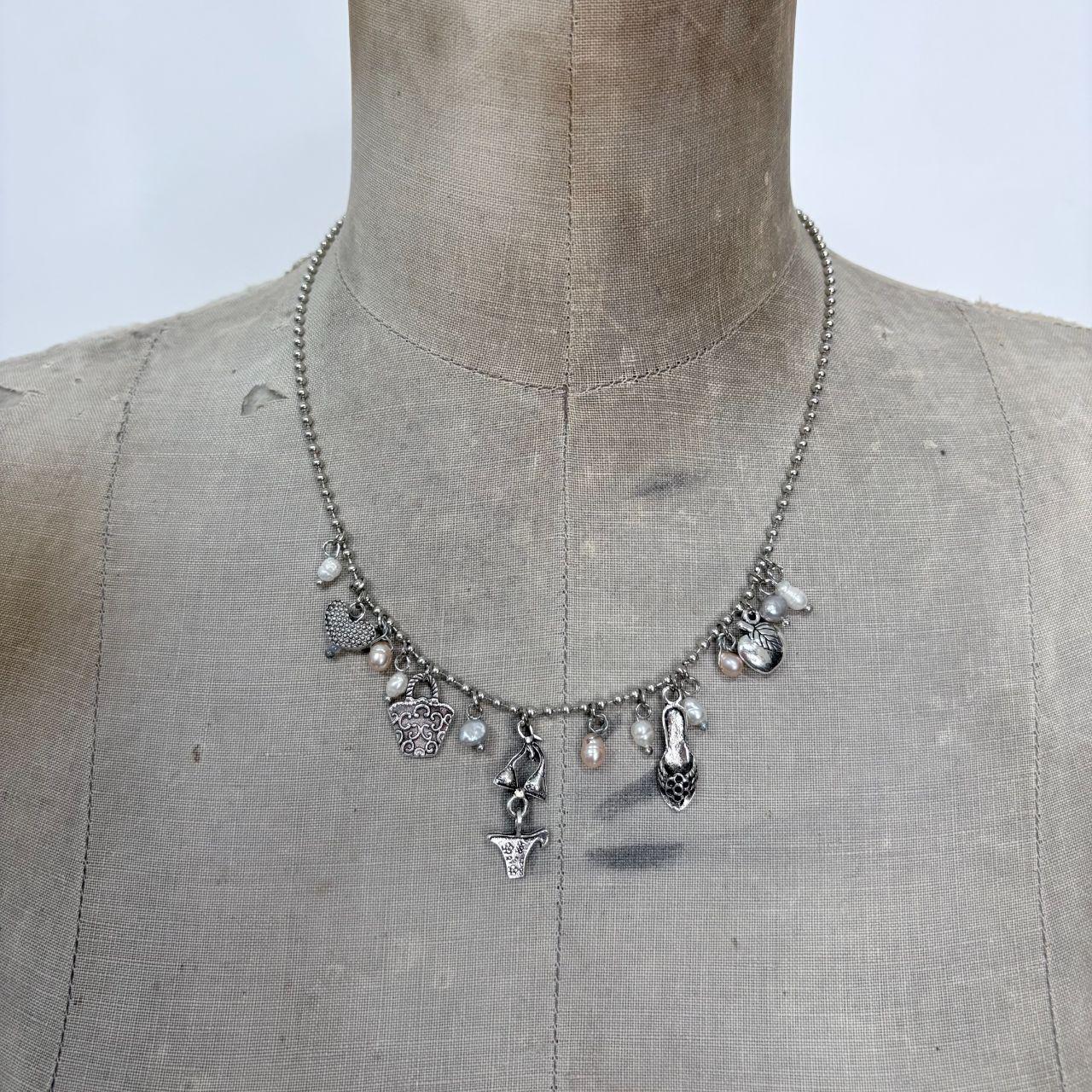 Silver charm pearl necklace