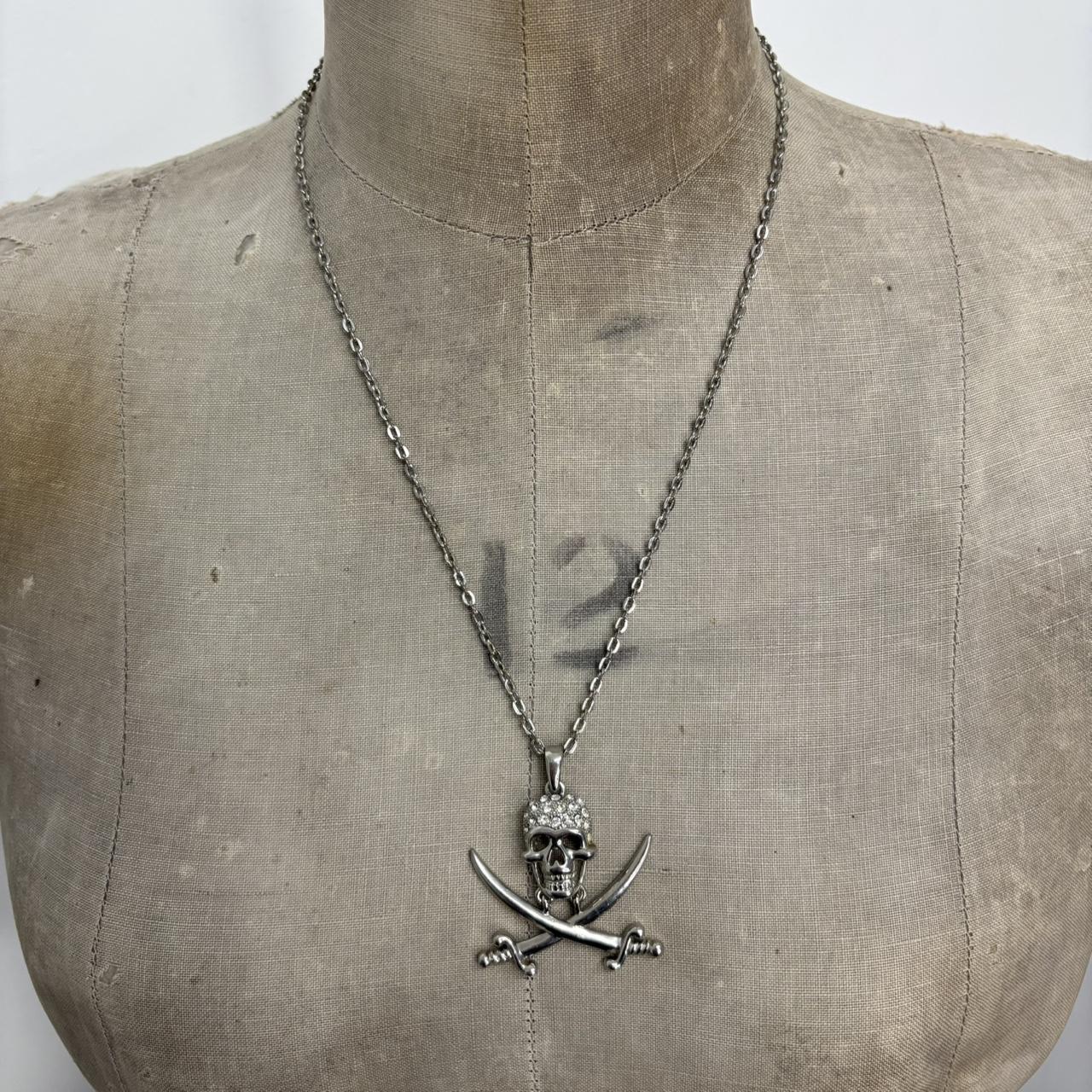 Silver skull and cross bone necklace