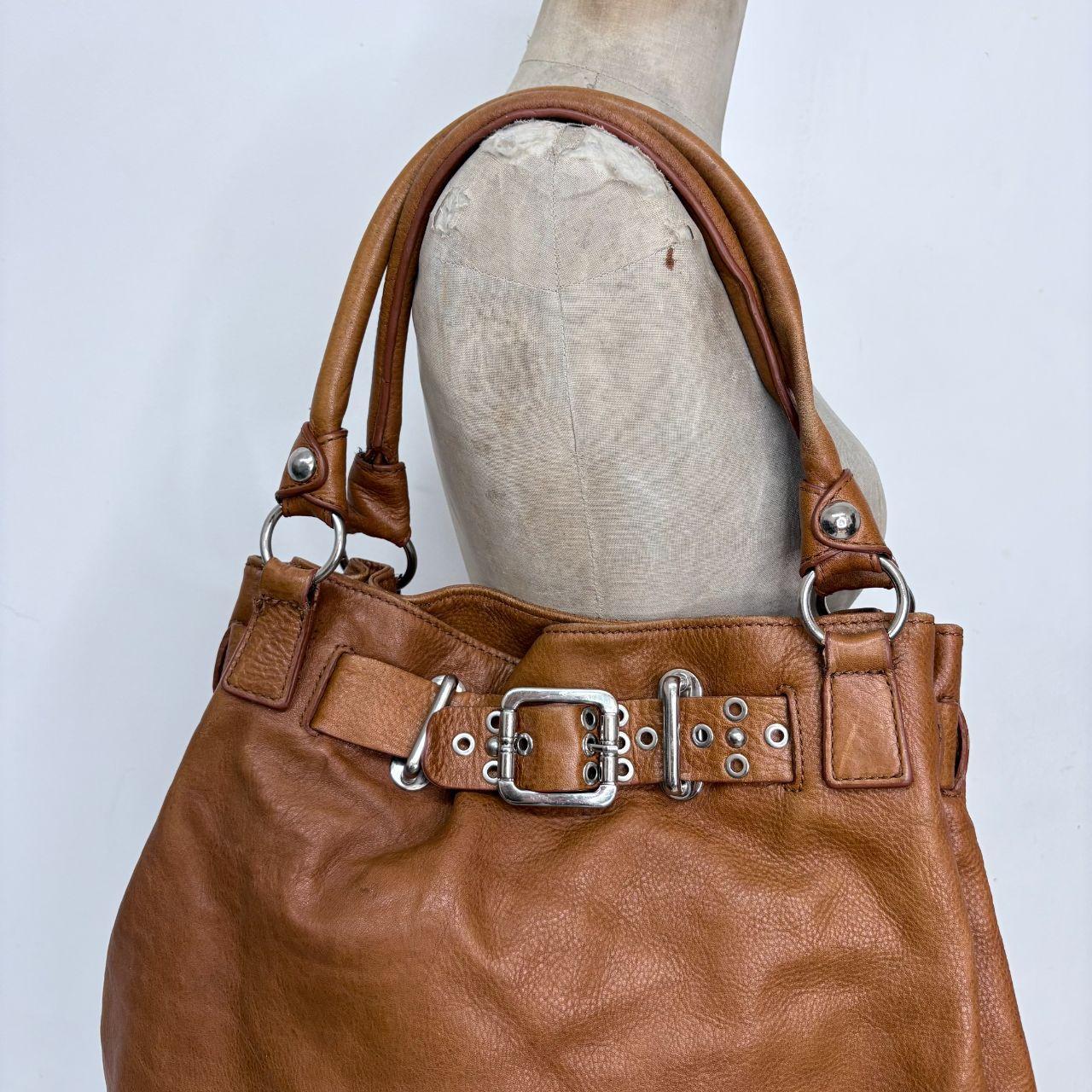 Tan leather buckle bag
