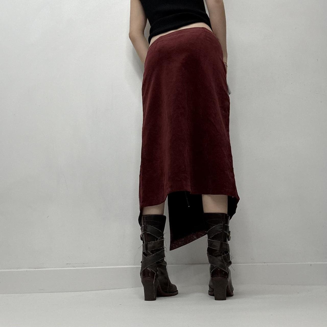Red leather eyelet studded asymmetric skirt