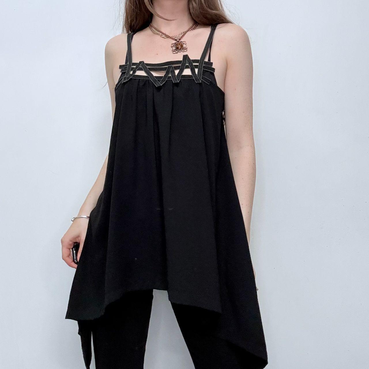Black asymmetric flared Cop Copine vest