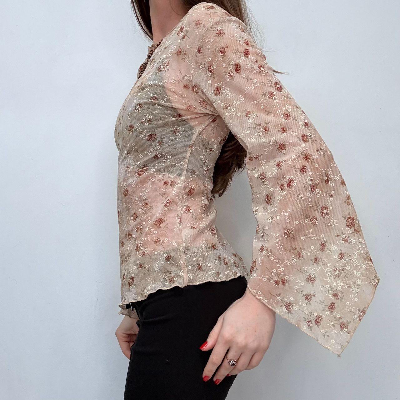 Asymmetric sheer flutter floral top