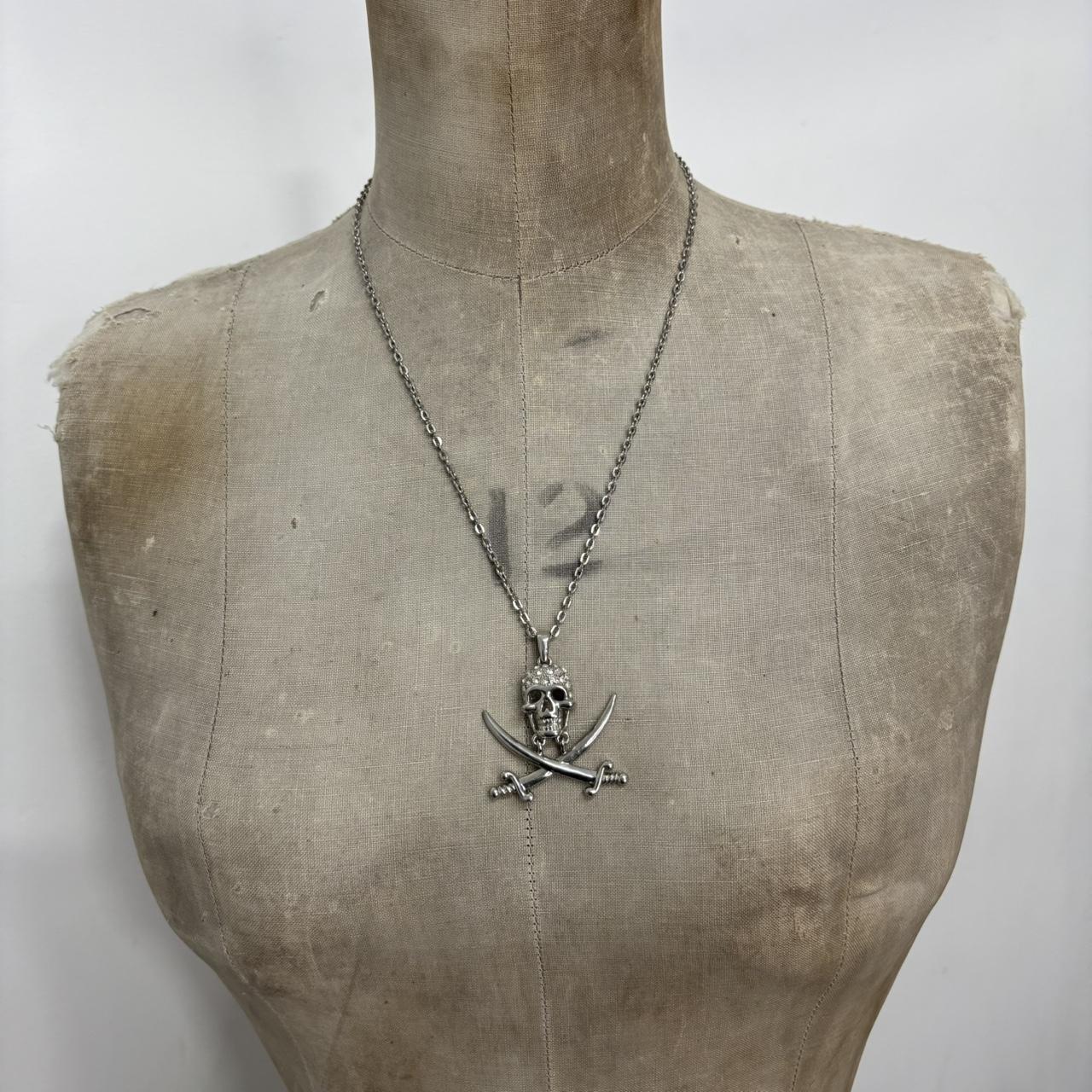 Silver skull and cross bone necklace