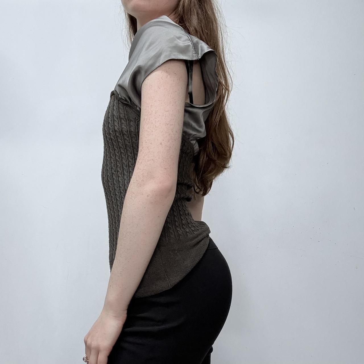 Draped off the shoulder vest