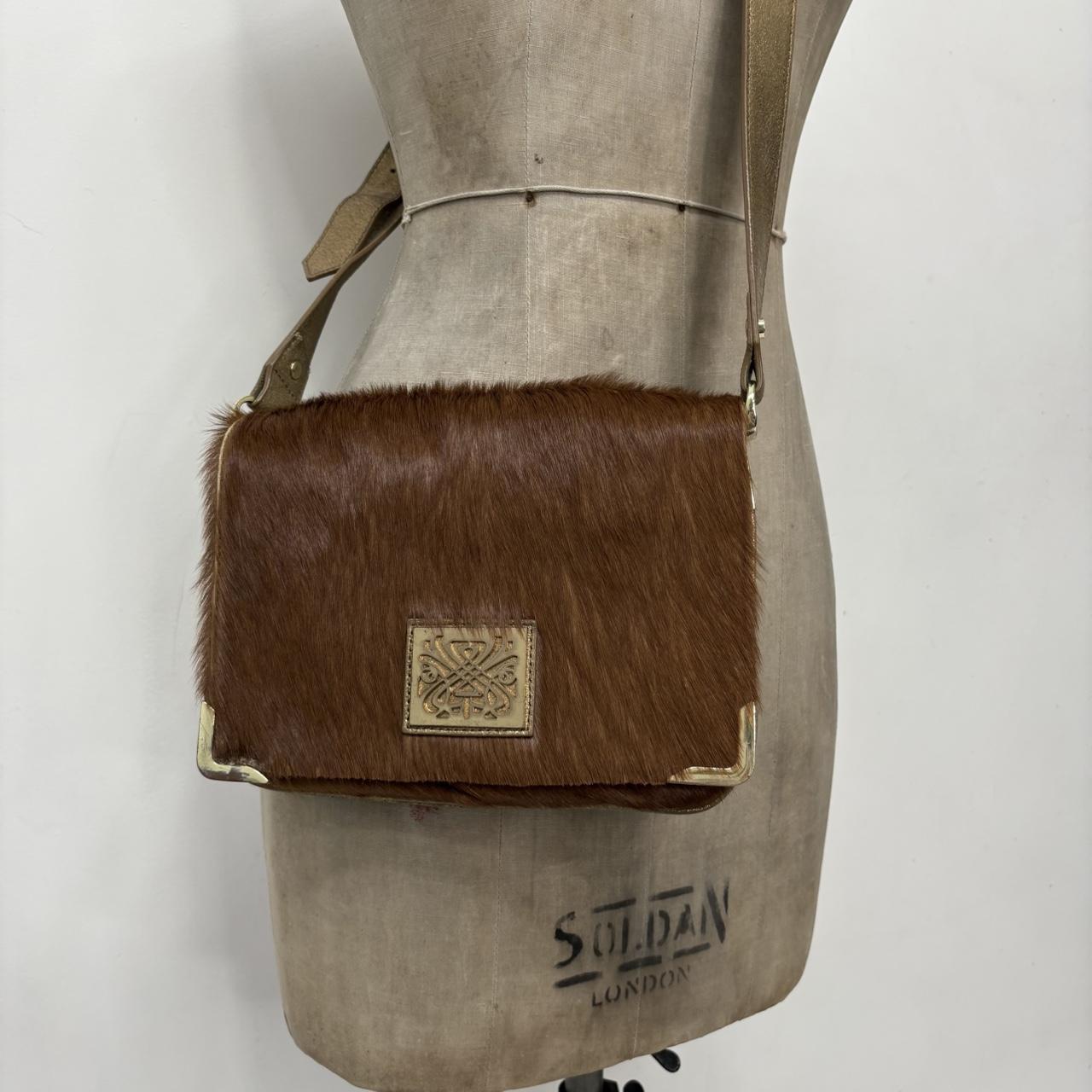 Tan pony hair cow hide cross body bag