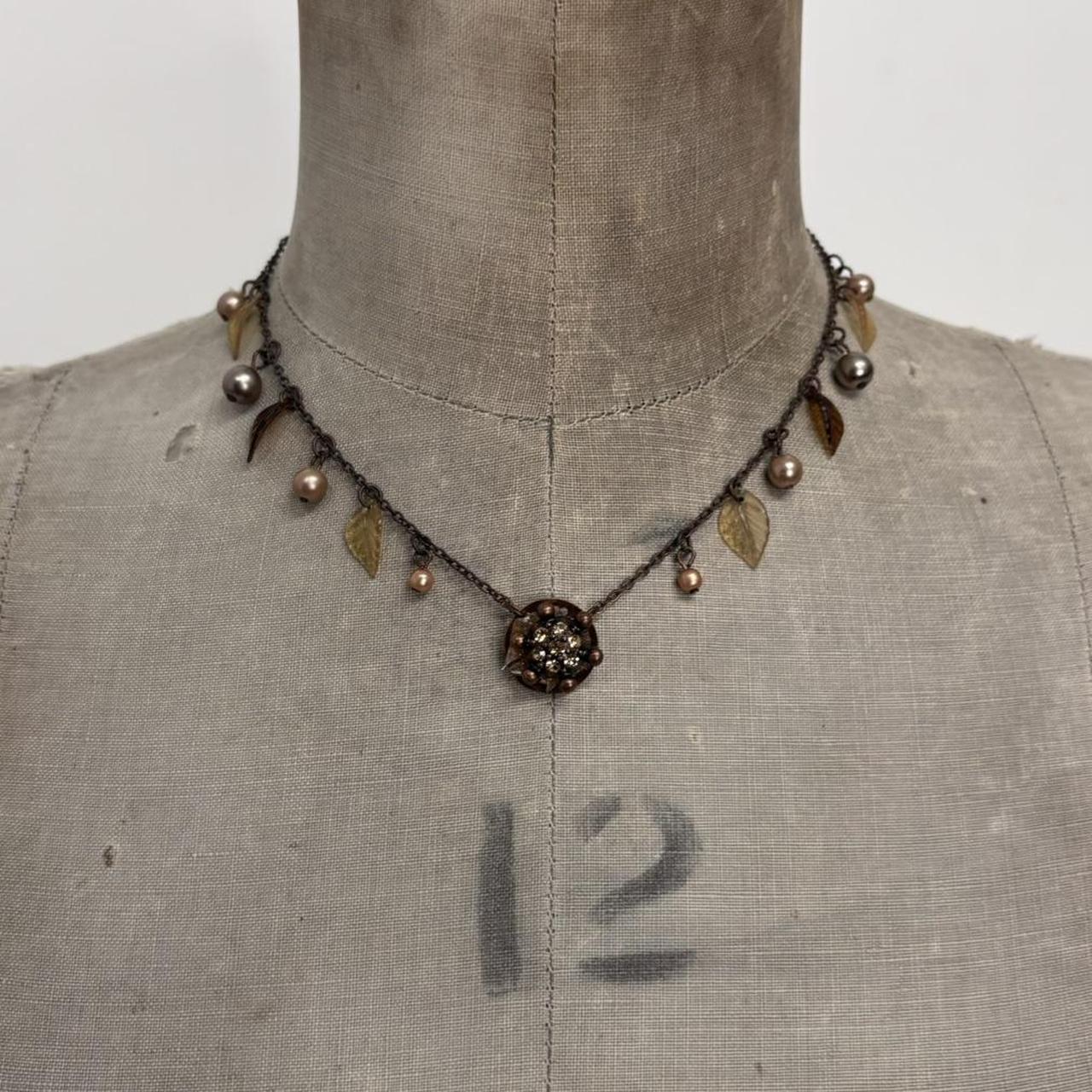 Brown metal hanging fairy necklace