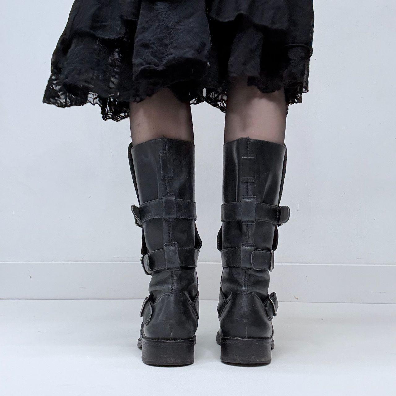 Black leather buckle boots