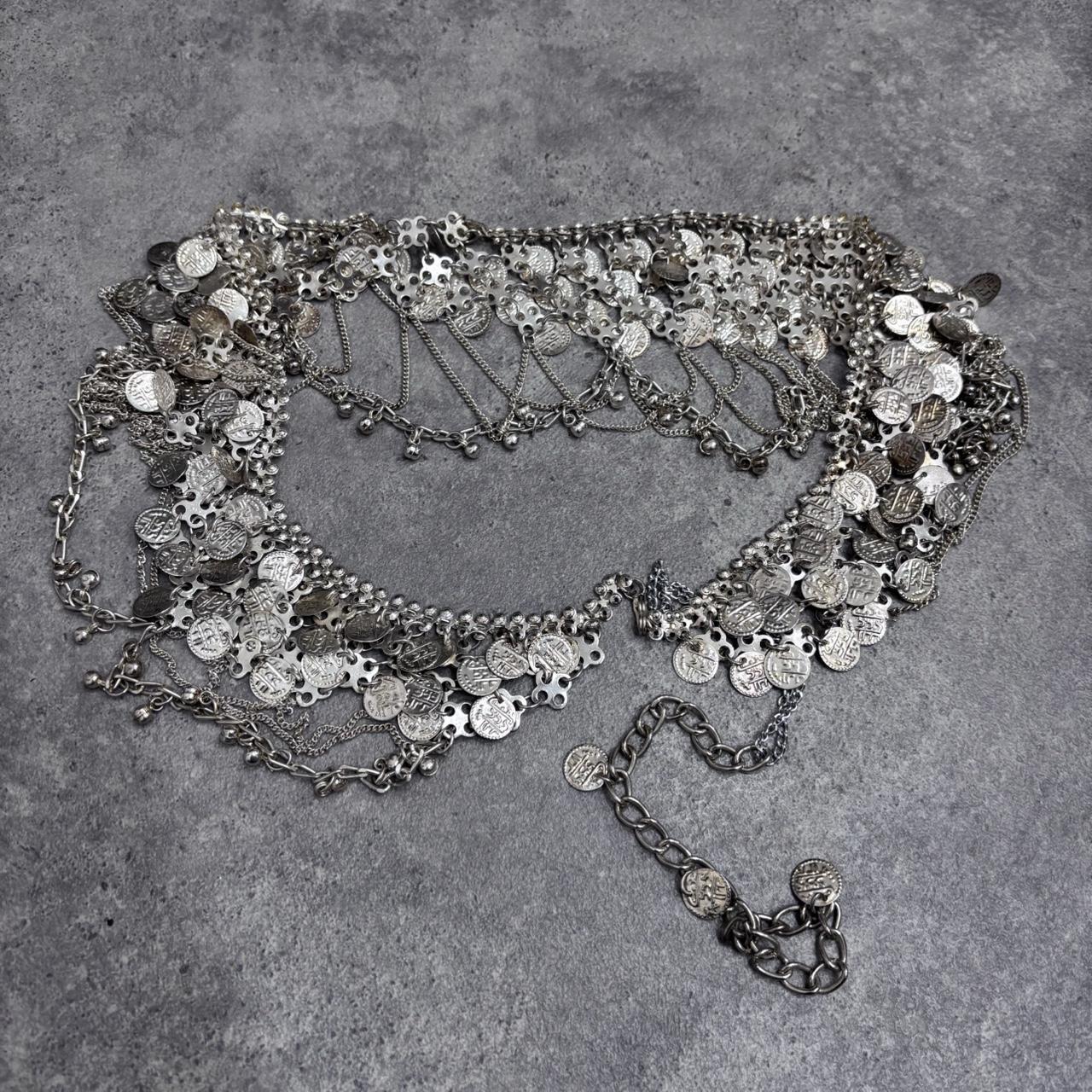 Silver coin draped chain belt