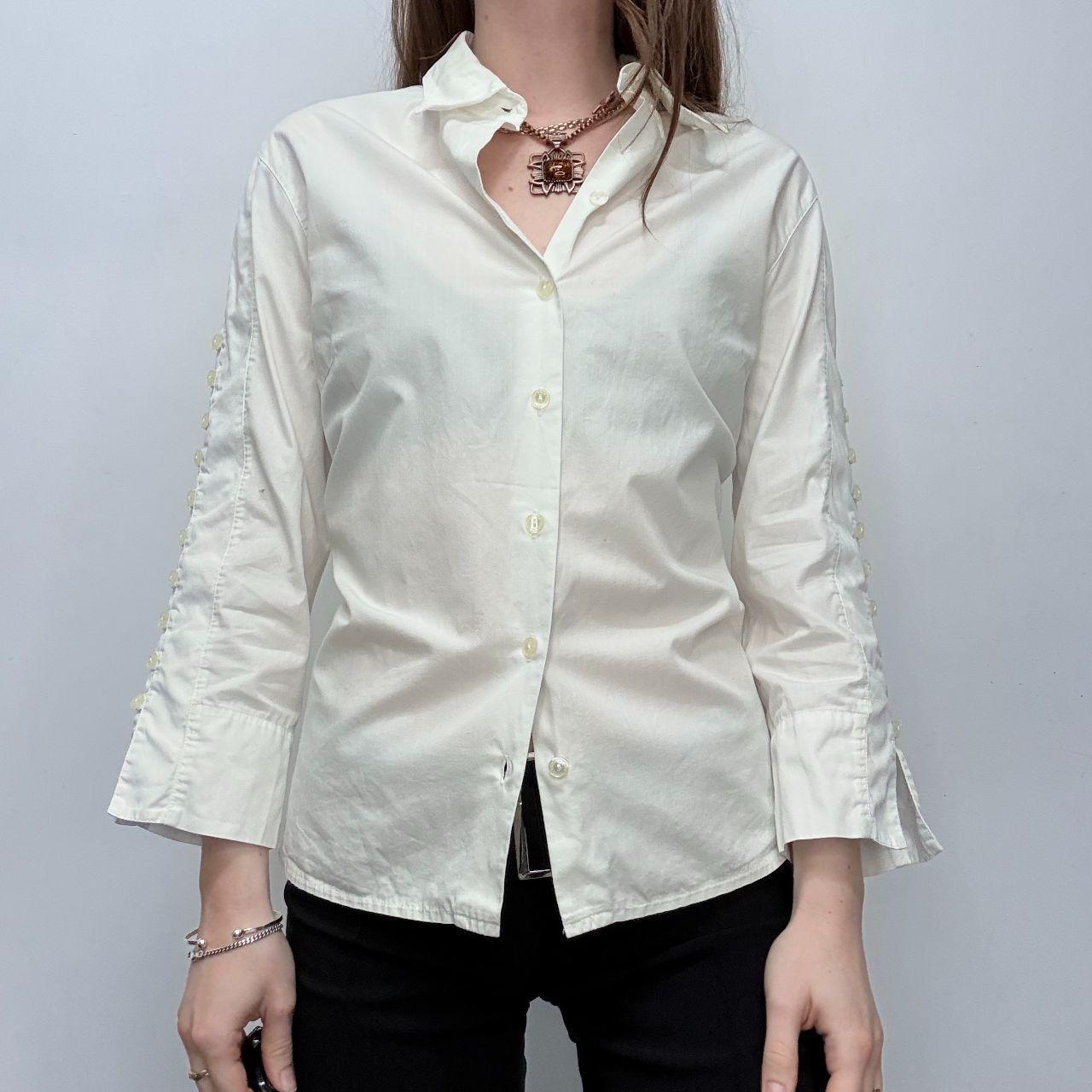 White flared button up shirt