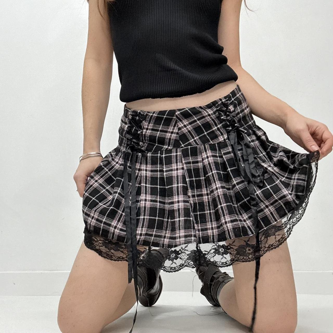 Black pleated mini tartan skirt
