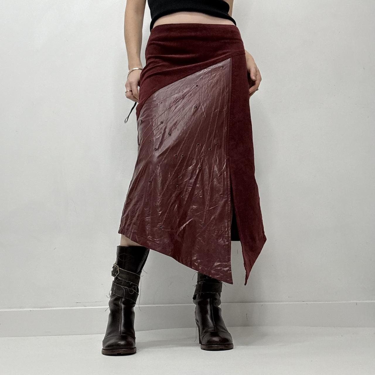 Red leather eyelet studded asymmetric skirt