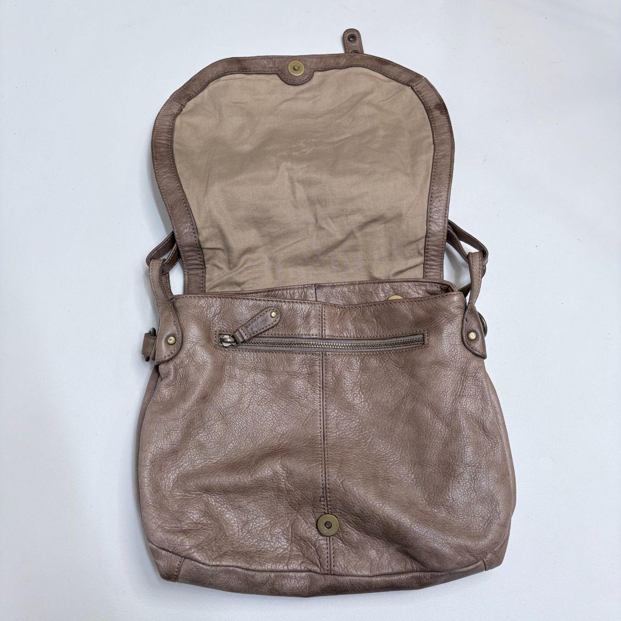 Tan leather slouchy buckle hobo bag