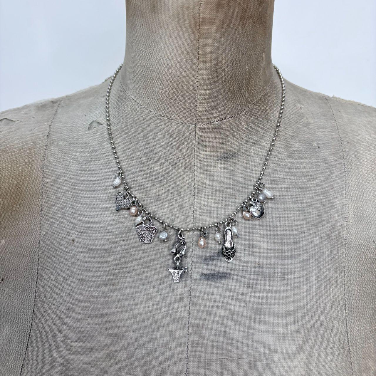 Silver charm pearl necklace