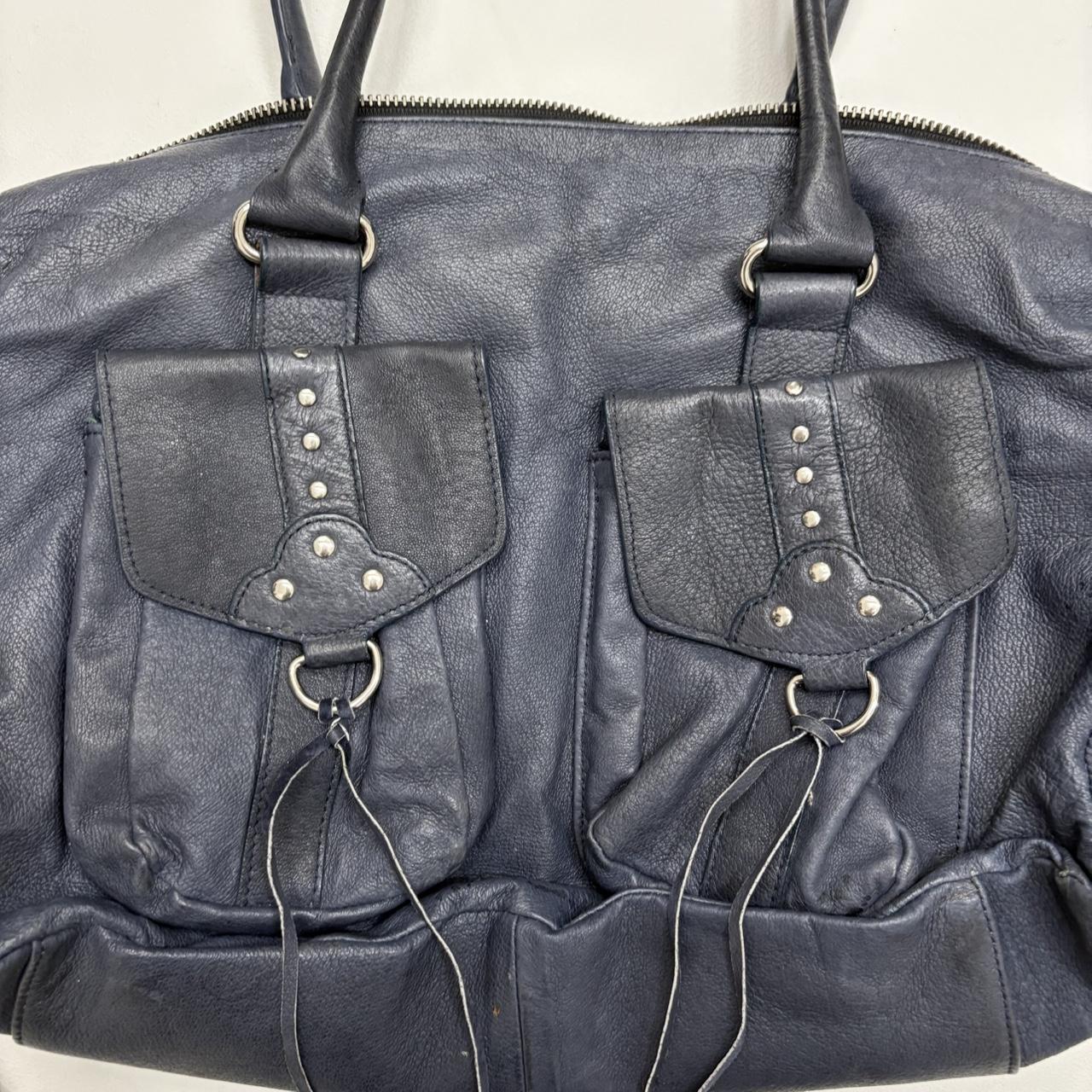 Blue leather studded city bag