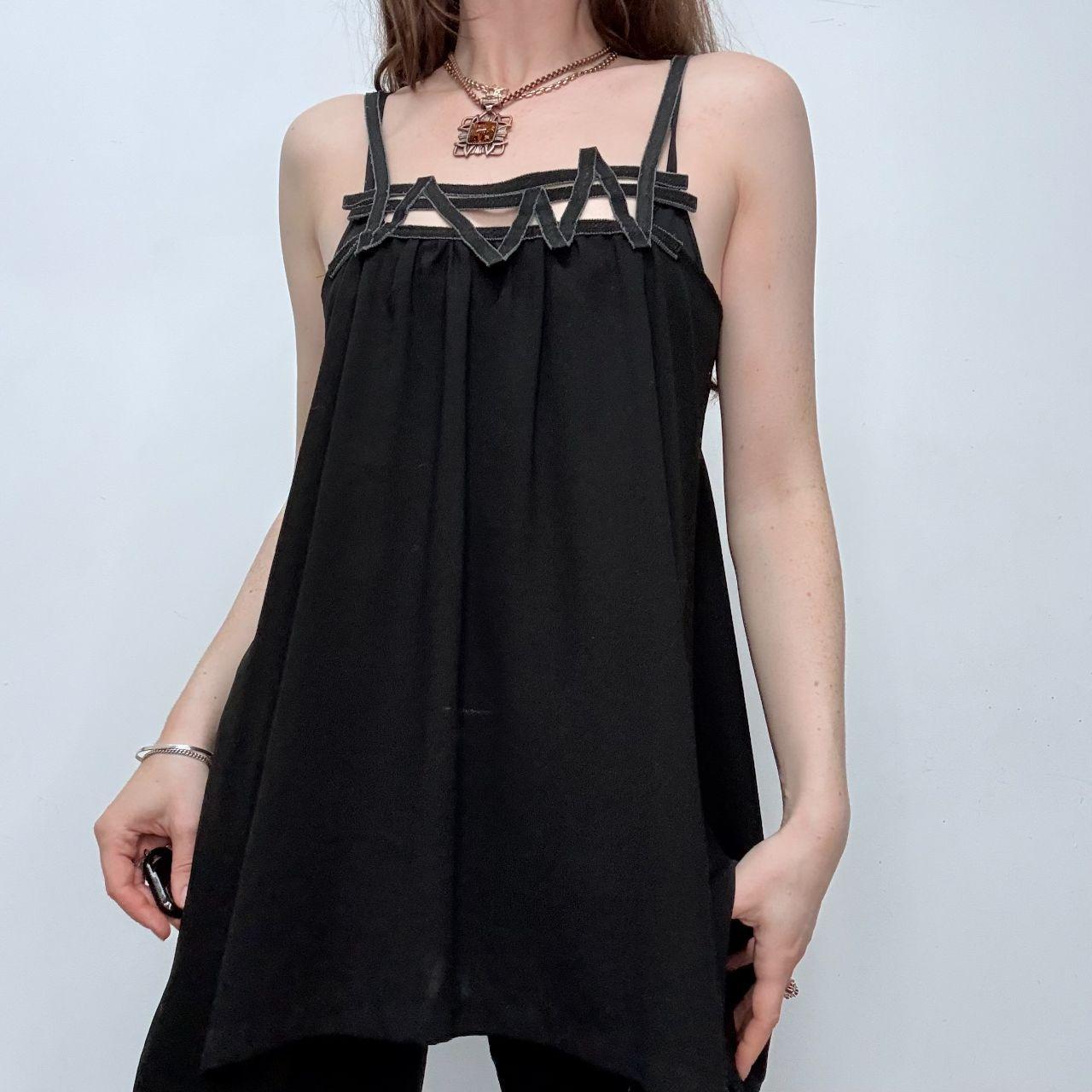 Black asymmetric flared Cop Copine vest