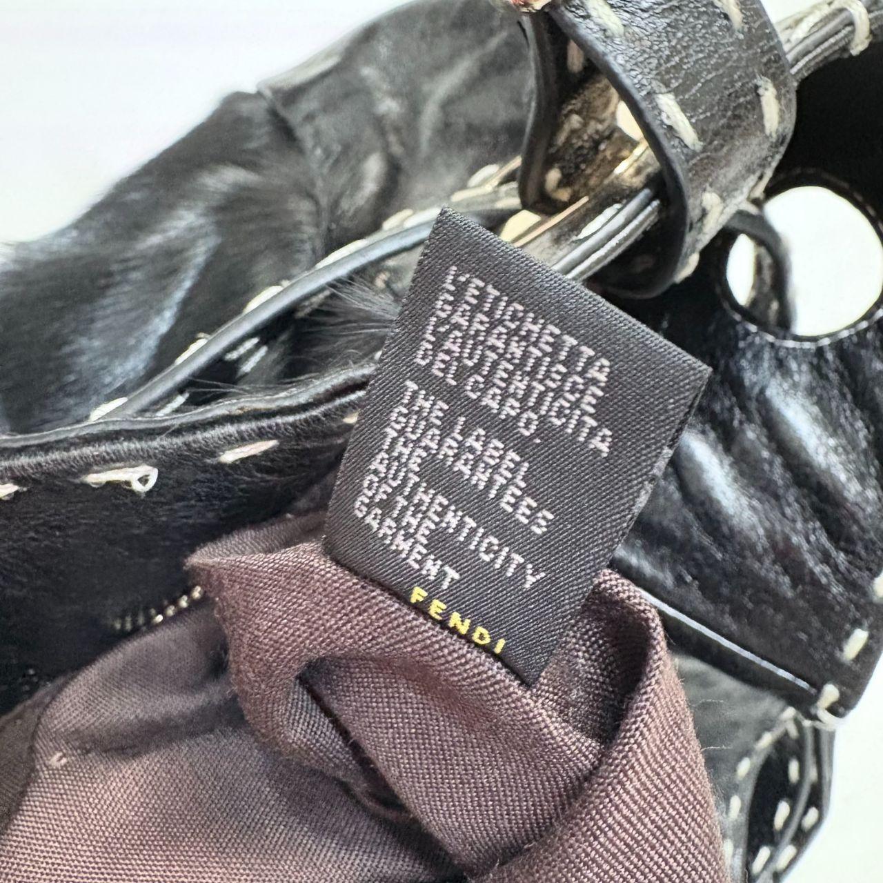 Black ponyhair Fendi eyelet bag