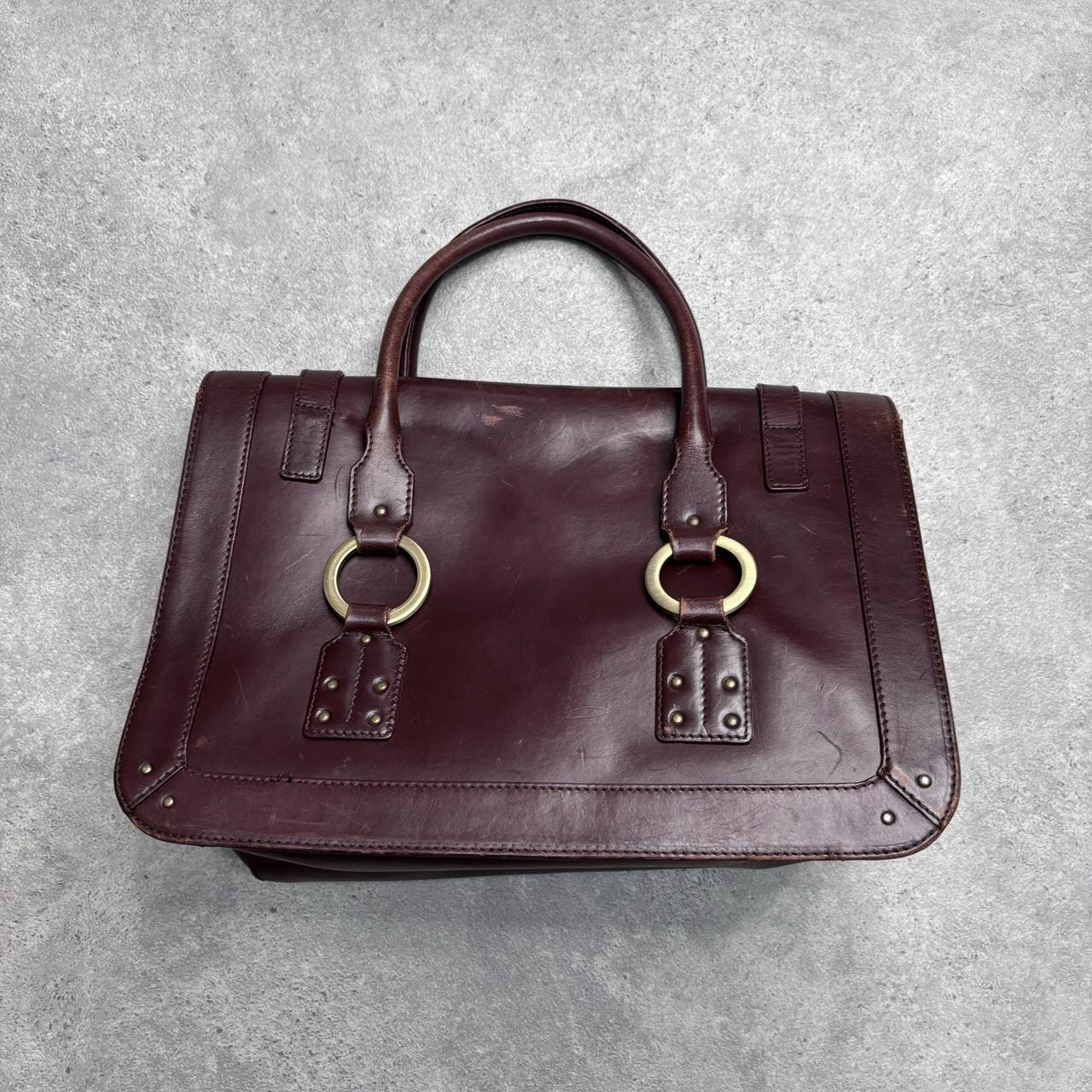 Burgandy leather strap bag