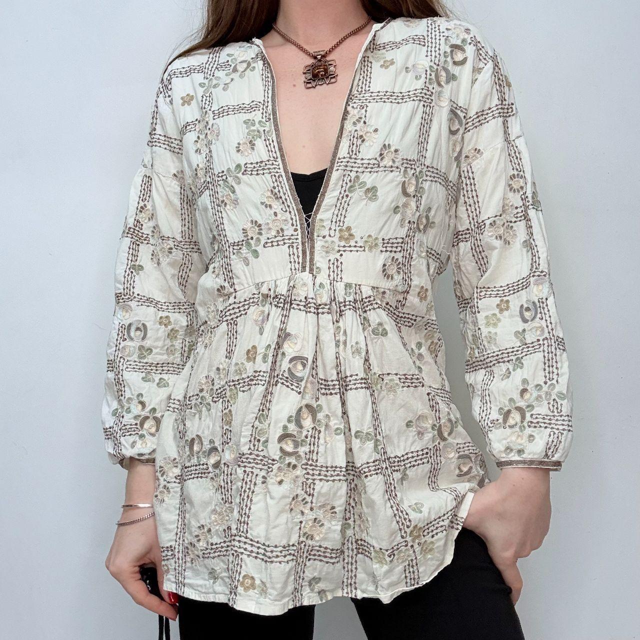 White embroidered flared puff sleeve shirt