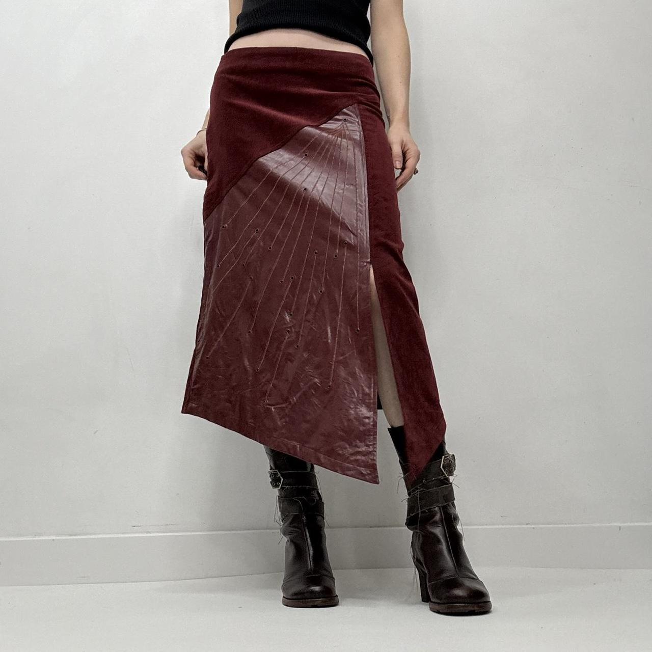 Red leather eyelet studded asymmetric skirt