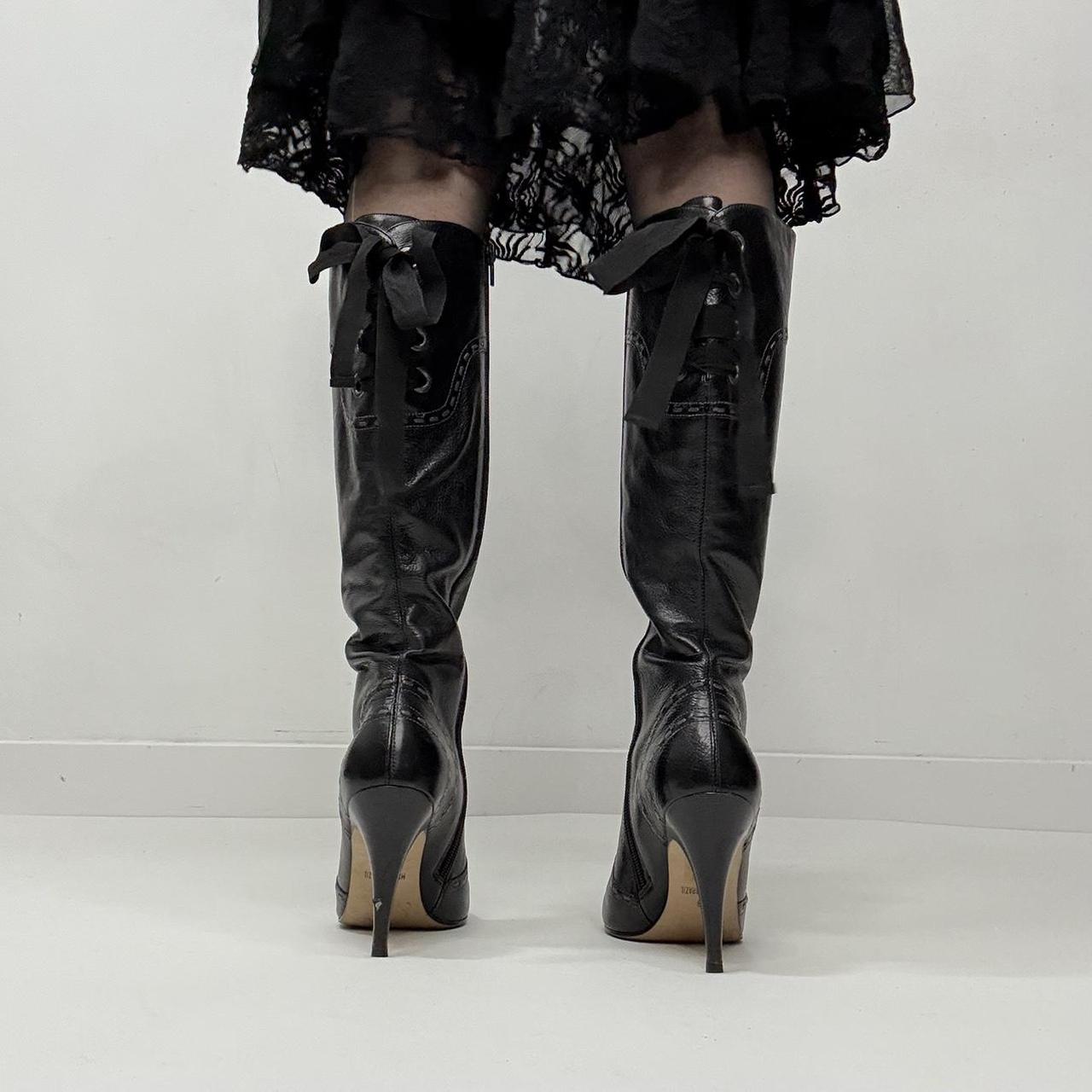 Black bow heel brogue boots