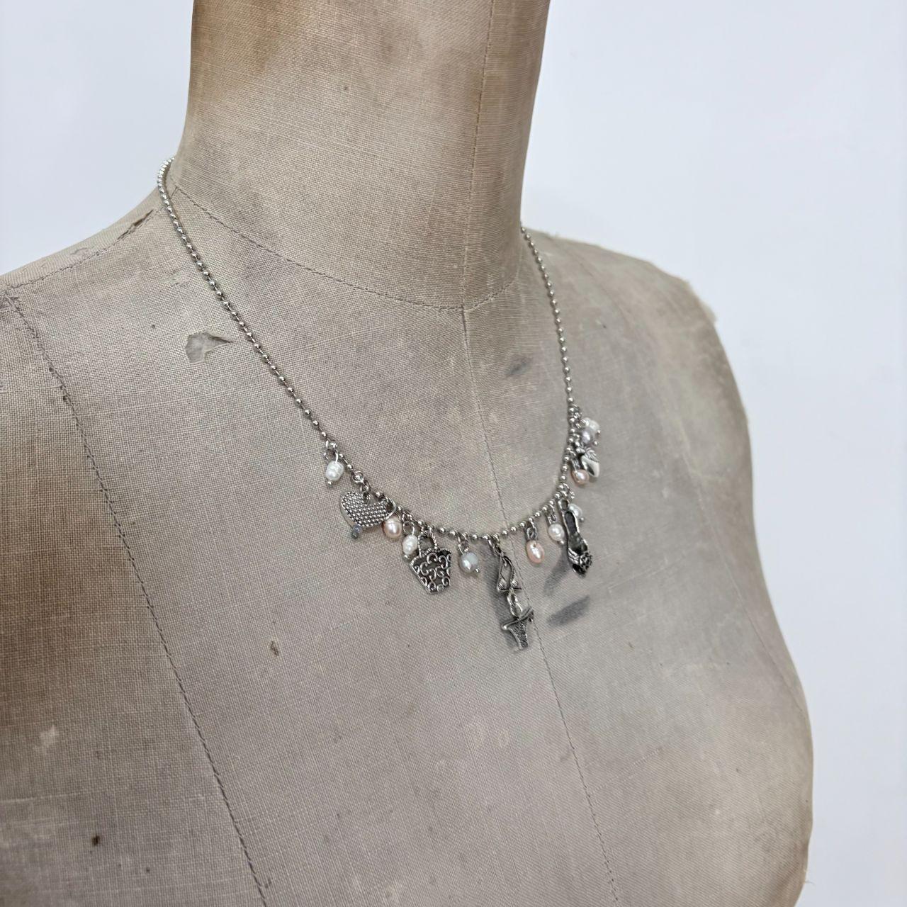 Silver charm pearl necklace