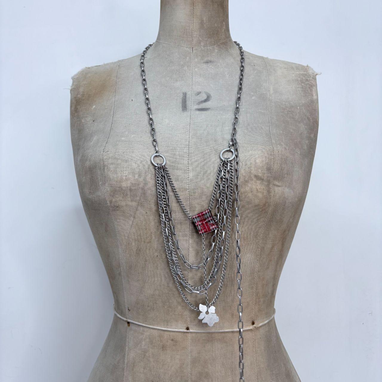 Silver draped cop copine waist chain