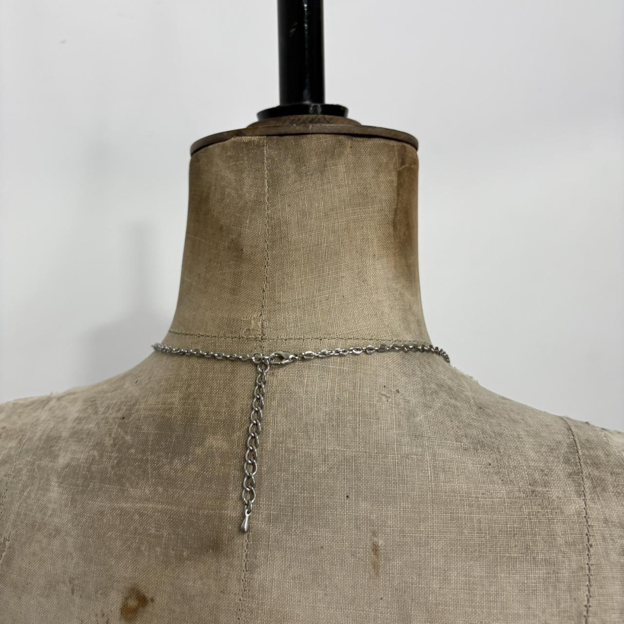 Silver skull and cross bone necklace