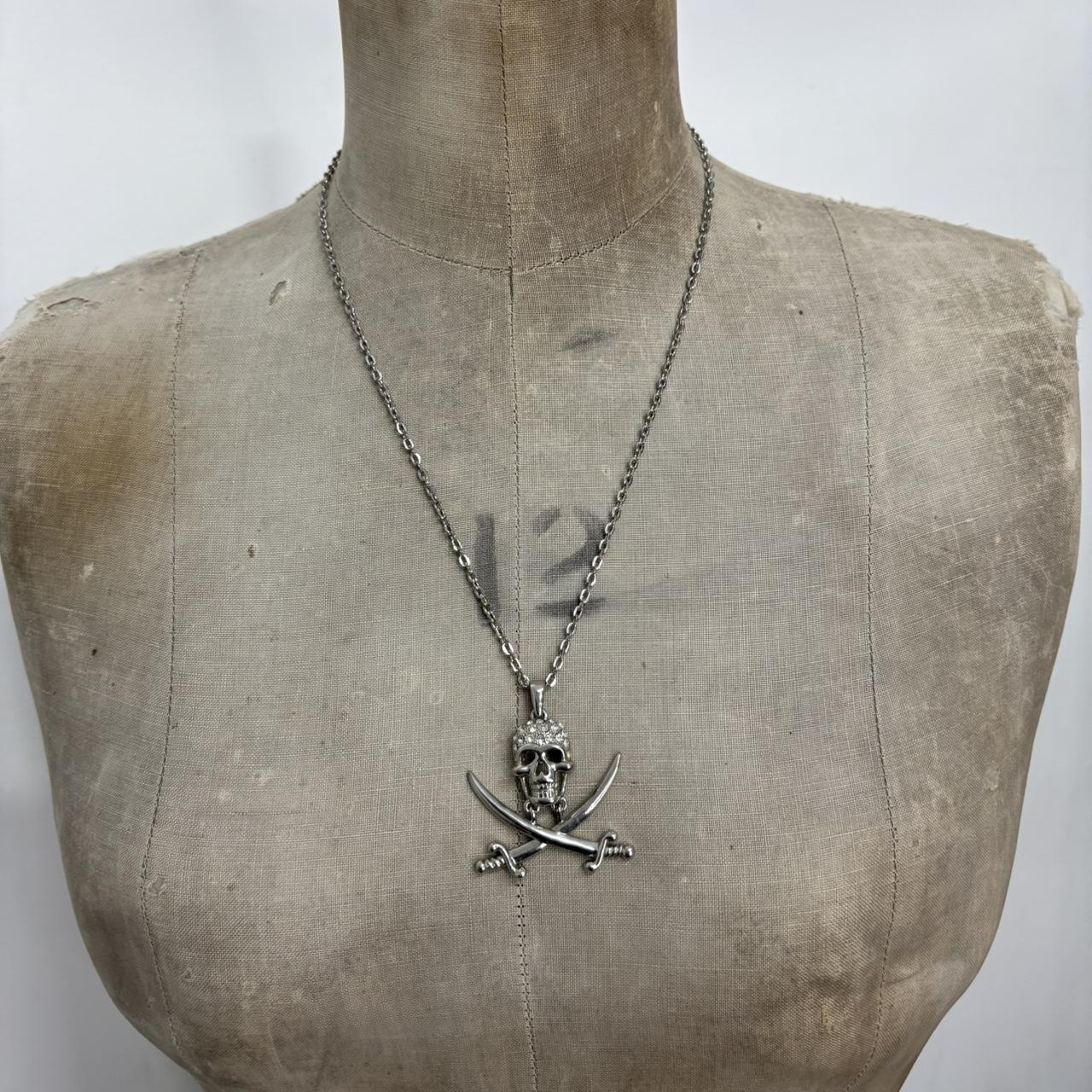 Silver skull and cross bone necklace