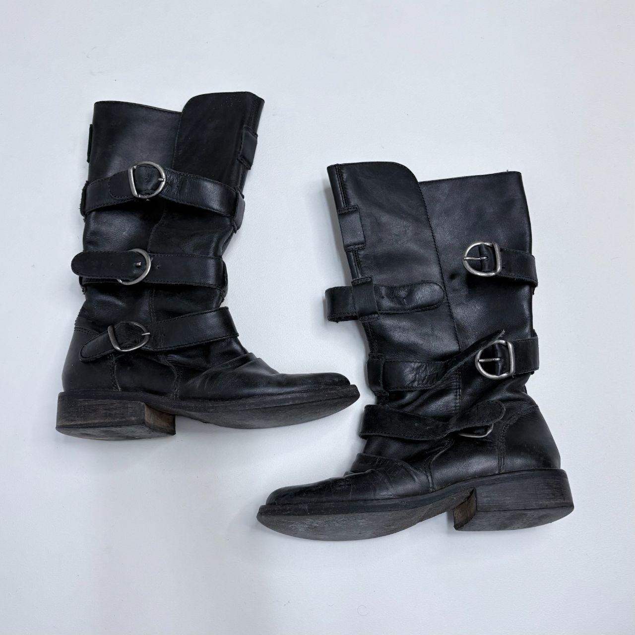 Black leather buckle boots