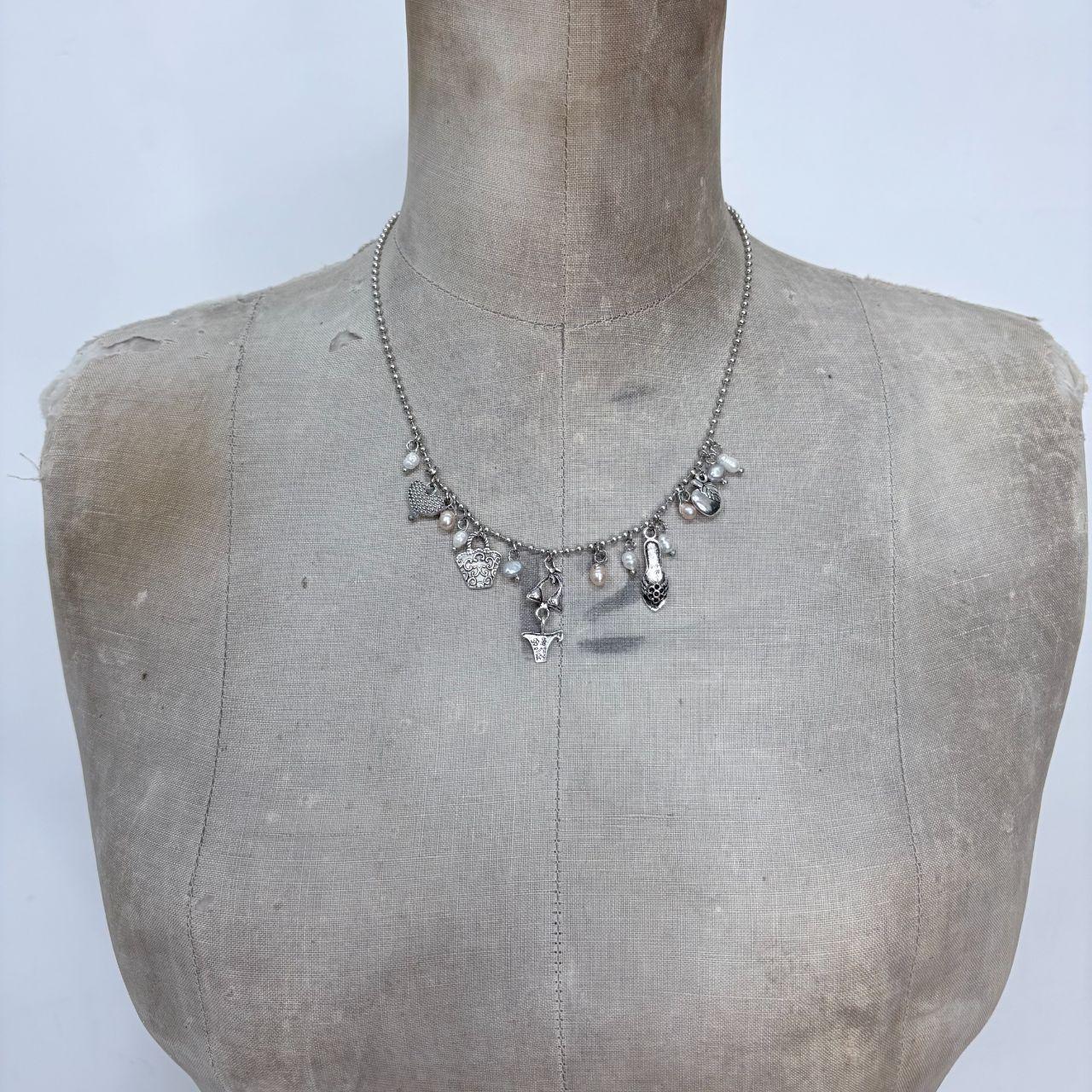Silver charm pearl necklace