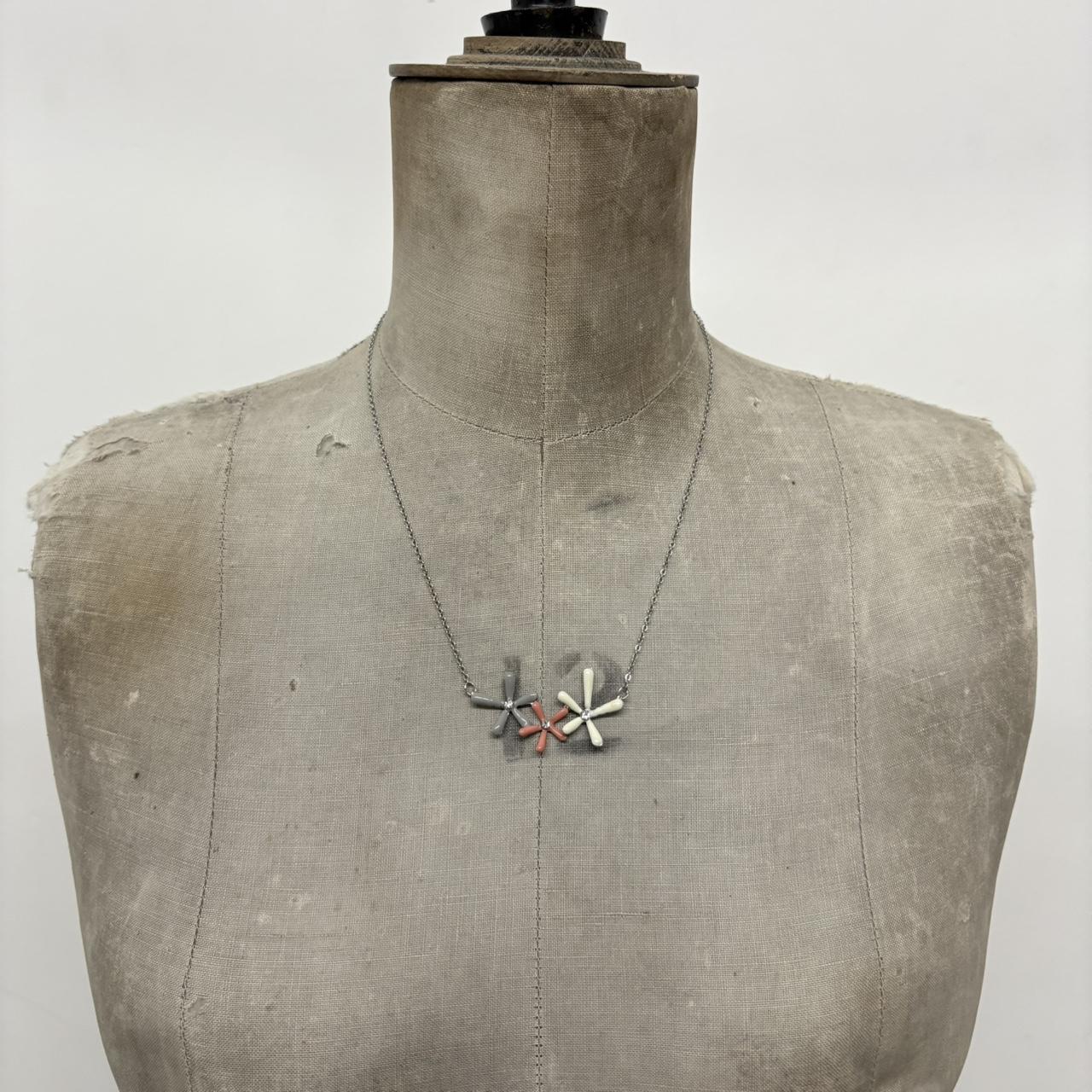 Silver flower pendant