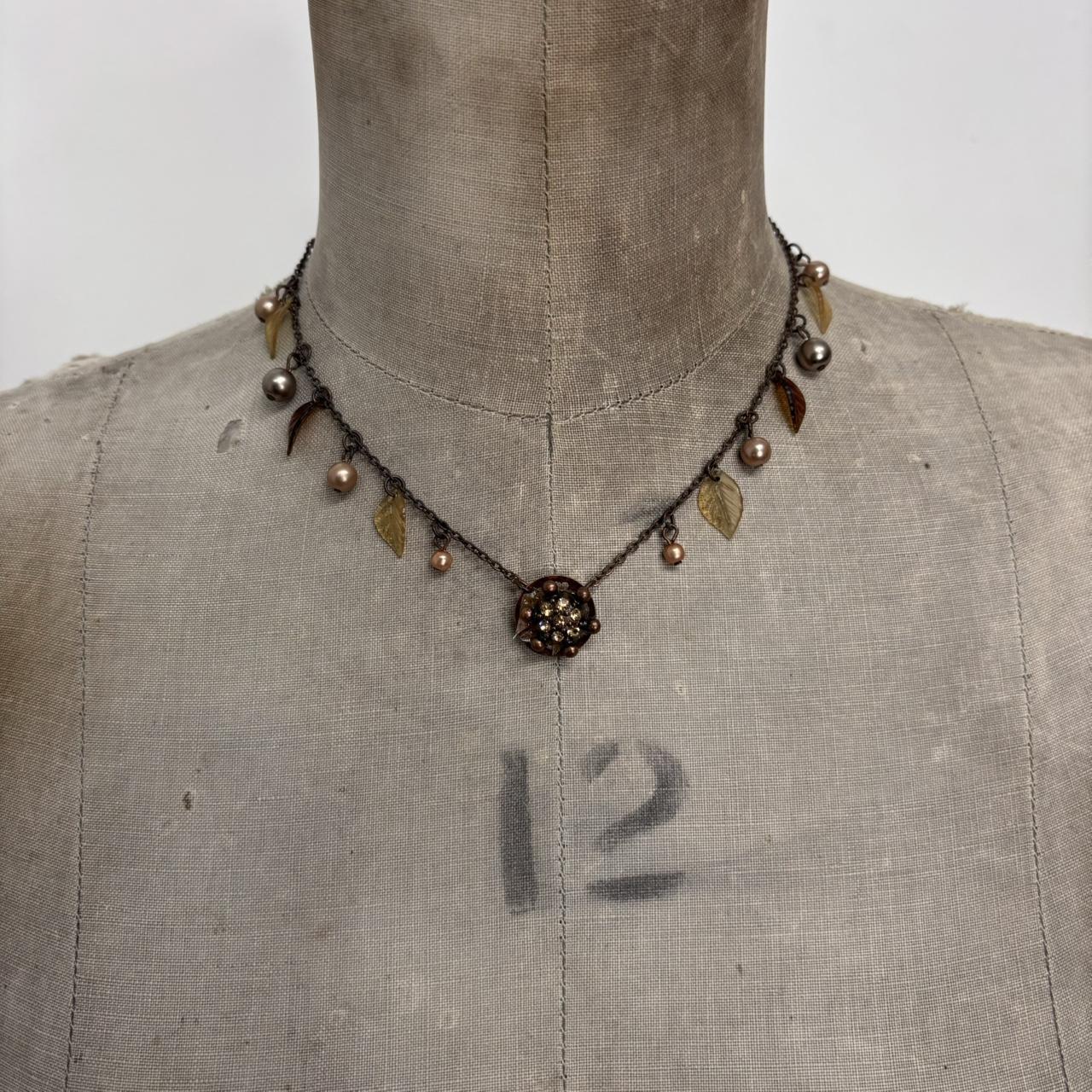 Brown metal hanging fairy necklace