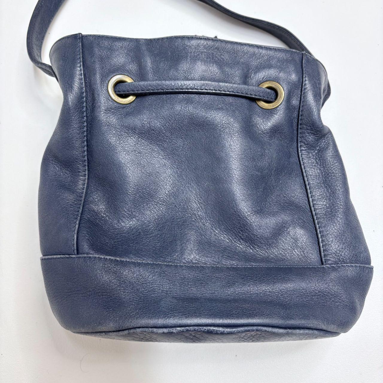 Navy blue tassle bucket bag