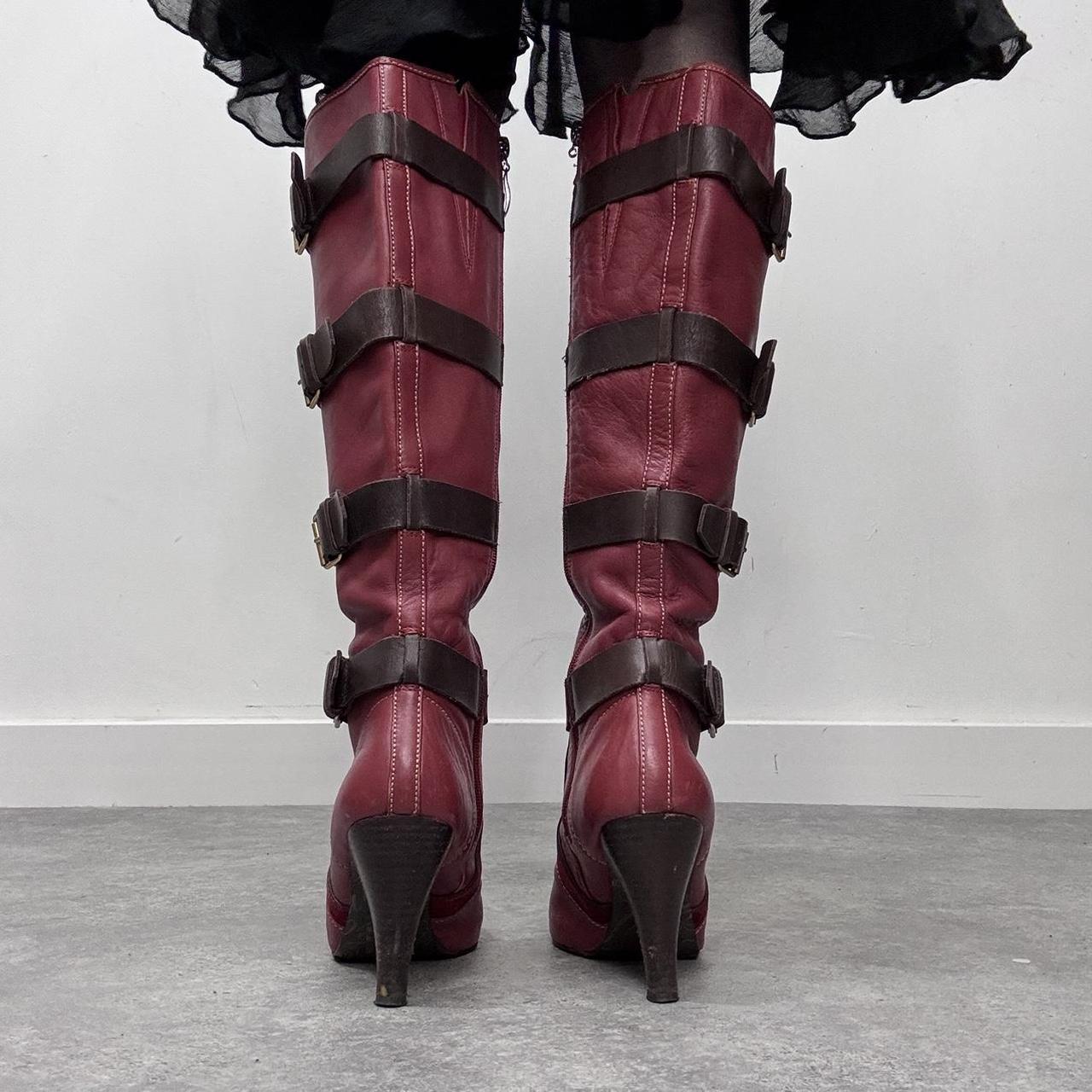 Red leather heel buckle boots