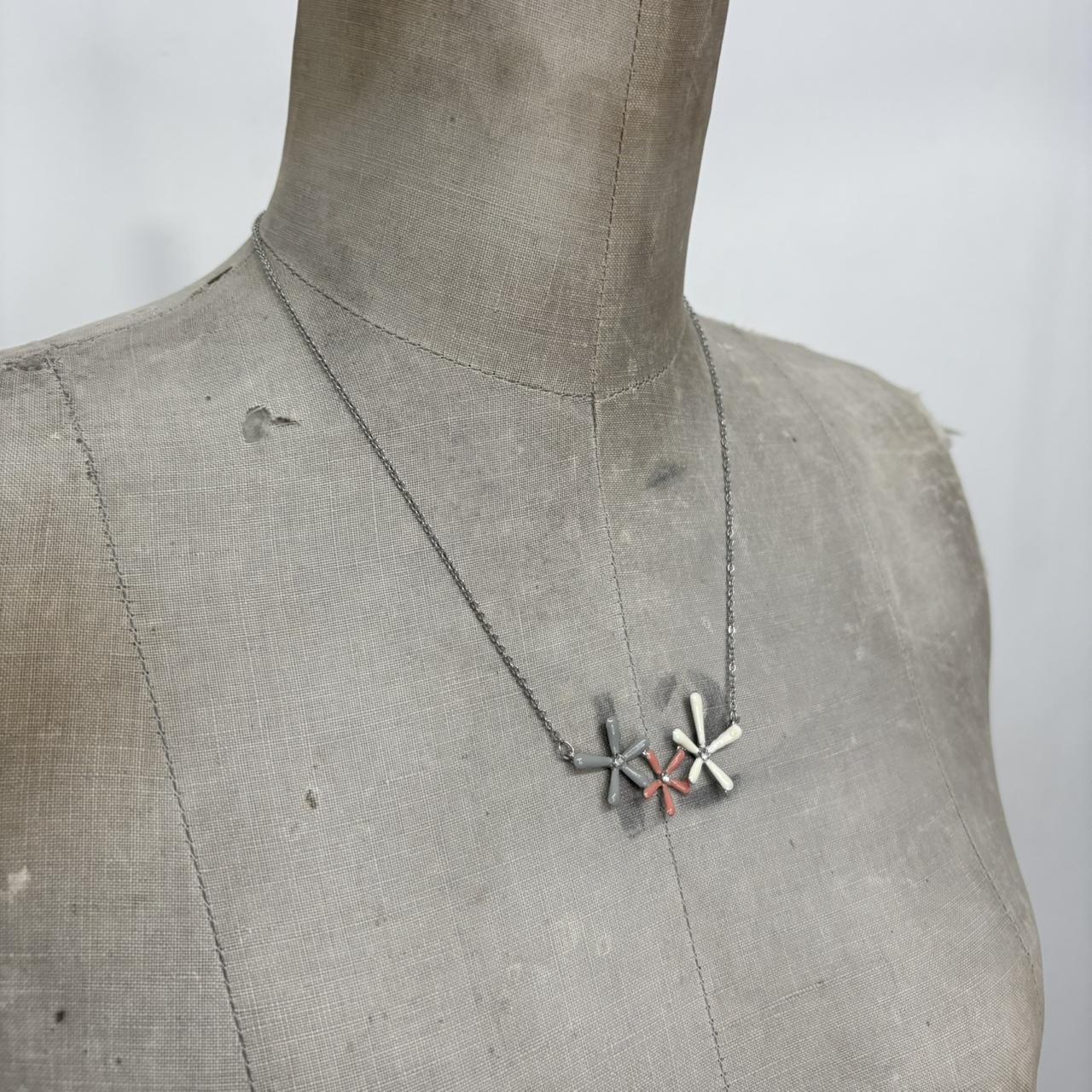 Silver flower pendant
