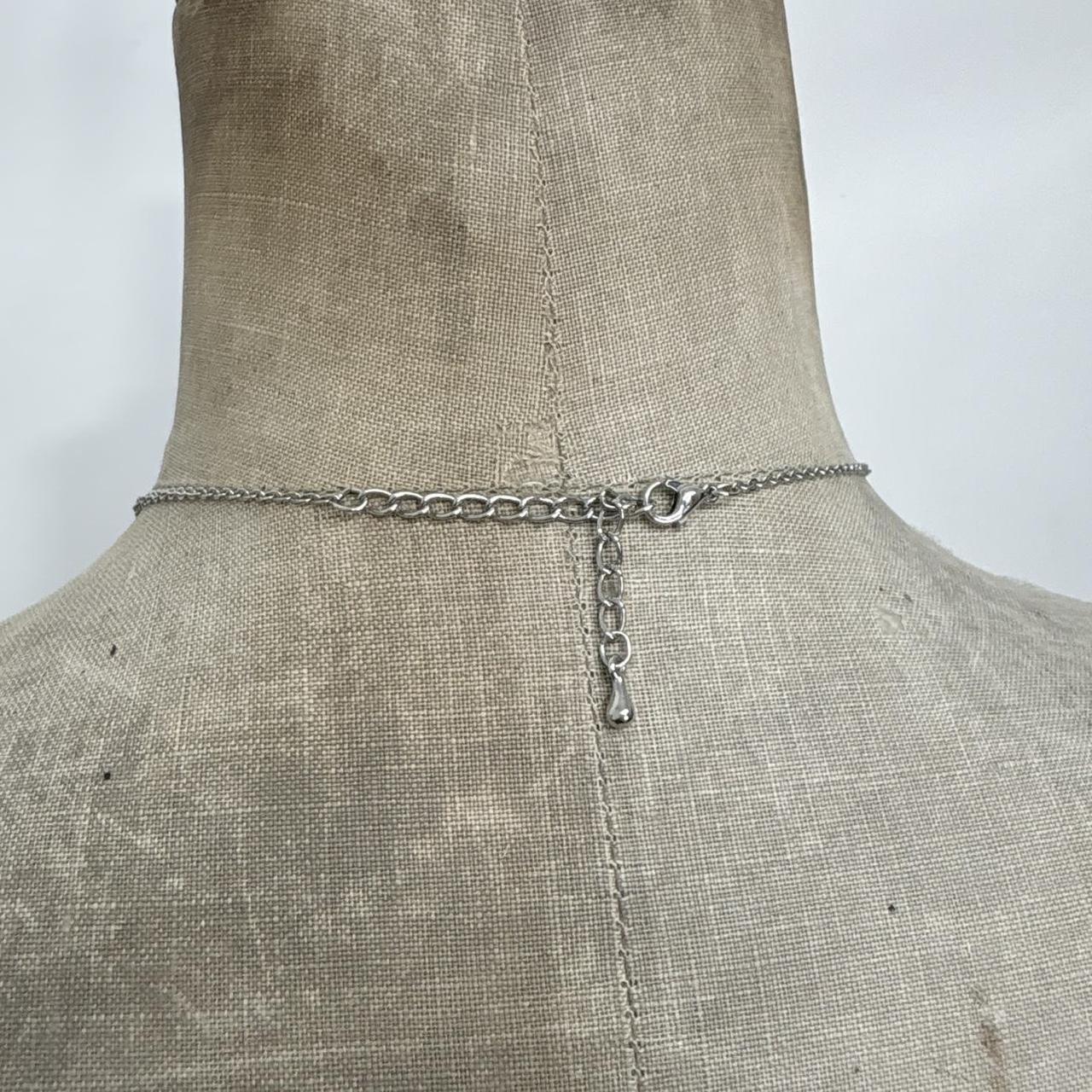 Silver flower pendant