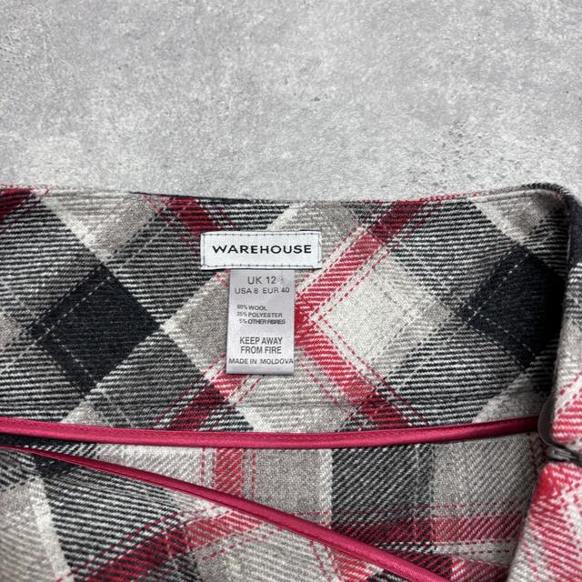 Black and red checked pleated kilt