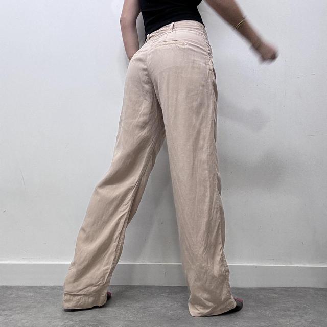 Tan pleated front wide leg trousers
