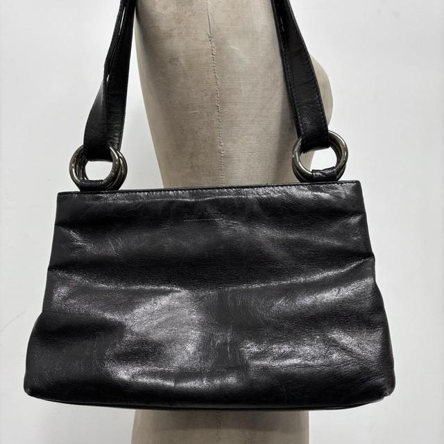 Black leather metal handware shoulder bag